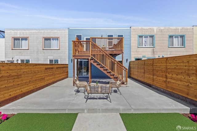 2055 42nd Ave, San Francisco, CA 94116 - back of house featuring stairway, a patio area, and a deck