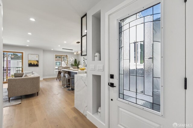 2055 42nd Ave, San Francisco, CA 94116 - foyer featuring light wood finished floors and recessed lighting
