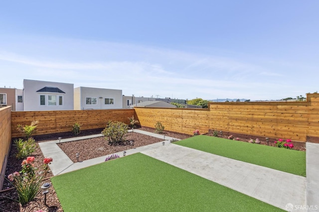 2055 42nd Ave, San Francisco, CA 94116 - fenced backyard featuring a patio