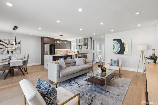 2055 42nd Ave, San Francisco, CA 94116 - living room featuring recessed lighting, a chandelier, and light wood-style flooring