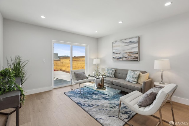 2055 42nd Ave, San Francisco, CA 94116 - living room with light wood-style floors and recessed lighting