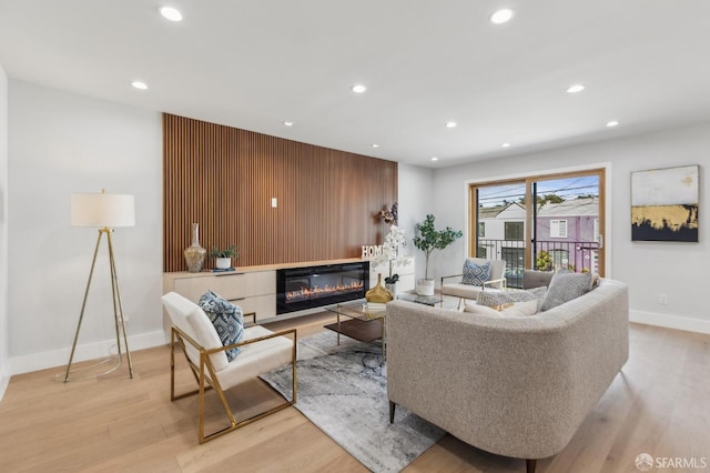 2055 42nd Ave, San Francisco, CA 94116 - living area featuring recessed lighting, light wood-type flooring, and a glass covered fireplace