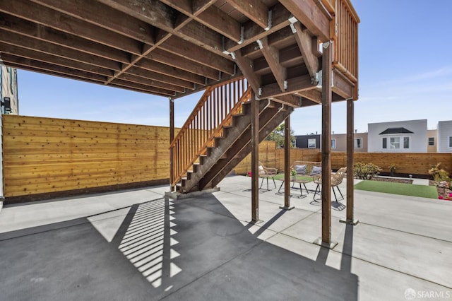 2055 42nd Ave, San Francisco, CA 94116 - fenced backyard with a patio and stairs