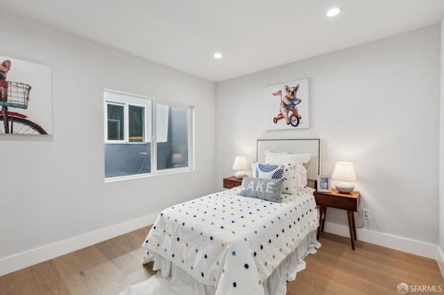2055 42nd Ave, San Francisco, CA 94116 - bedroom with light wood-style flooring and recessed lighting
