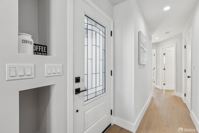 2055 42nd Ave, San Francisco, CA 94116 - entrance foyer with light wood-style floors and recessed lighting