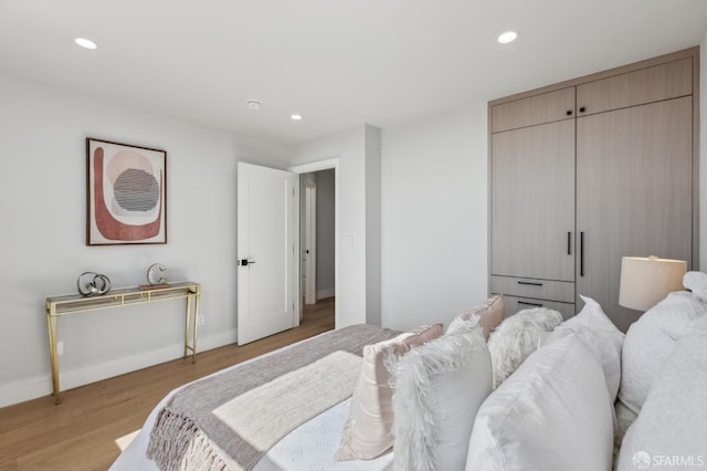 2055 42nd Ave, San Francisco, CA 94116 - bedroom with light wood-style floors and recessed lighting