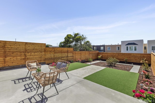 2055 42nd Ave, San Francisco, CA 94116 - fenced backyard with a patio area