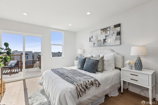2055 42nd Ave, San Francisco, CA 94116 - bedroom with access to exterior, wood finished floors, and recessed lighting