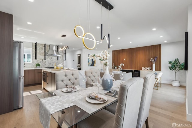 2055 42nd Ave, San Francisco, CA 94116 - dining area featuring recessed lighting, light wood-style floors, and a chandelier