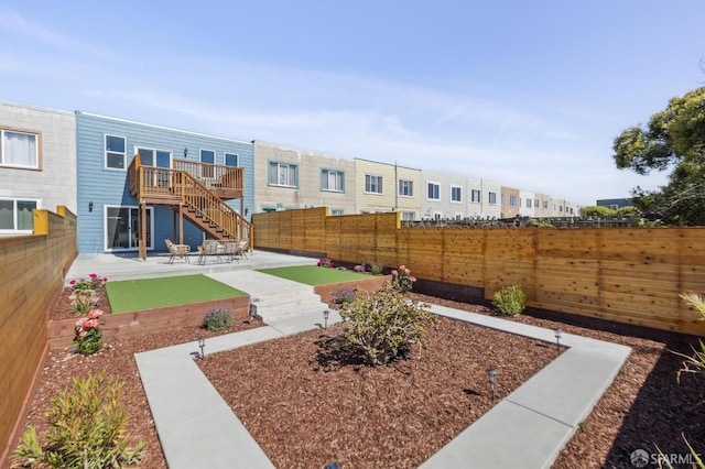 2055 42nd Ave, San Francisco, CA 94116 - fenced backyard featuring a patio and stairs
