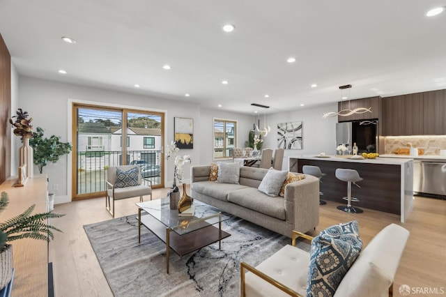2055 42nd Ave, San Francisco, CA 94116 - living area with light wood-type flooring, healthy amount of natural light, and recessed lighting