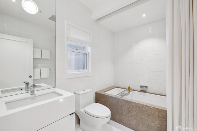 full bathroom featuring toilet, a washtub, tile walls, and vanity