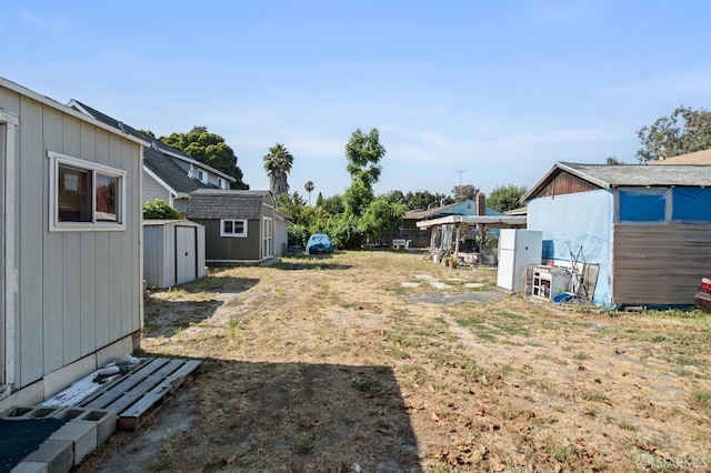 2340 Cooley Ave, East Palo Alto, CA 94303 - view of yard with an outdoor structure and a shed