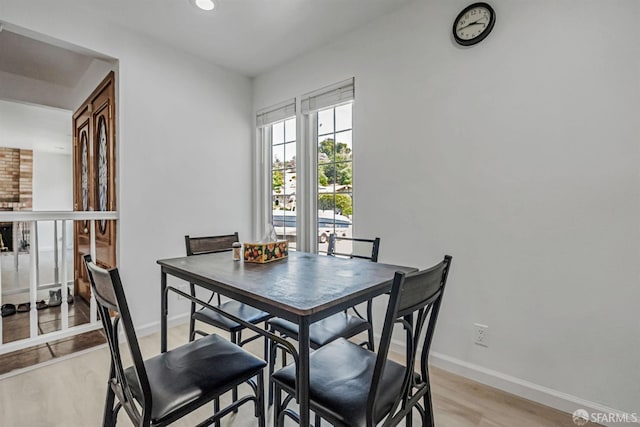 2675 Simas Ave, Pinole, CA 94564 - dining area with light wood-style flooring and recessed lighting