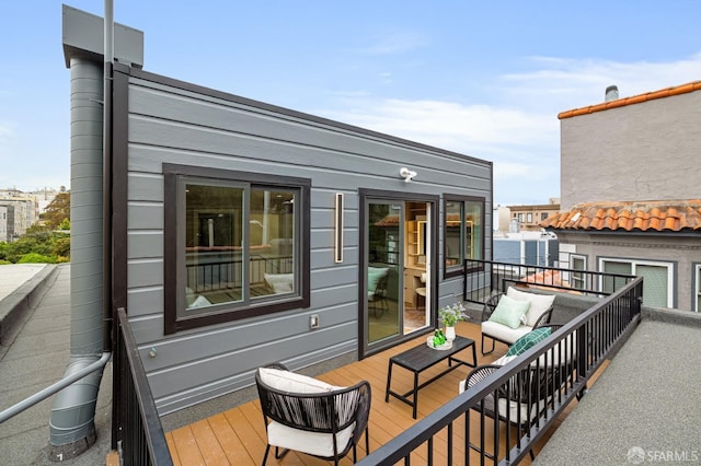 deck with an outdoor hangout area
