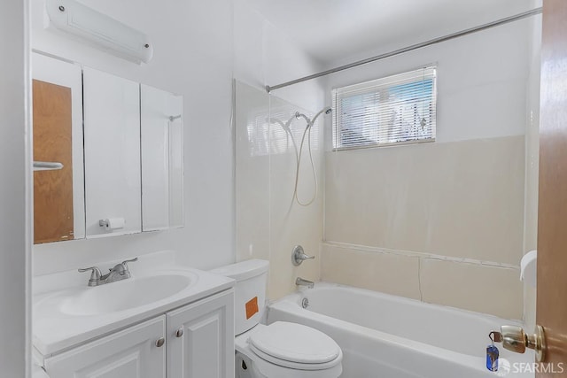 full bath with an AC wall unit, shower / bath combination, vanity, and toilet