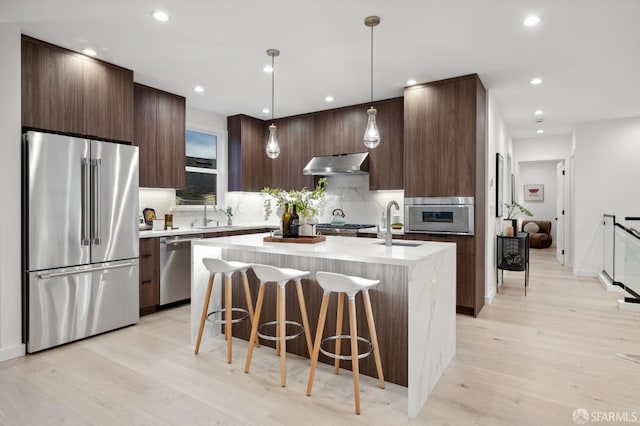 26 Southwood Dr, San Francisco, CA 94112 - kitchen with stainless steel appliances, modern cabinets, recessed lighting, an island with sink, and a sink