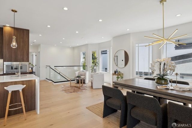 26 Southwood Dr, San Francisco, CA 94112 - dining area with light wood-style floors and recessed lighting