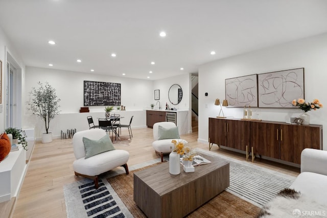 26 Southwood Dr, San Francisco, CA 94112 - living area featuring light wood finished floors, recessed lighting, wine cooler, and baseboards
