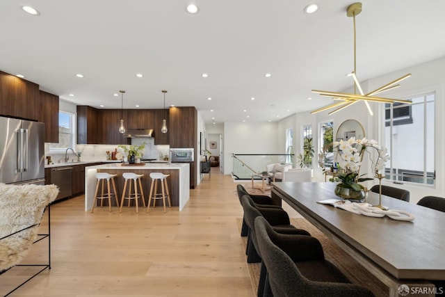 26 Southwood Dr, San Francisco, CA 94112 - dining room featuring recessed lighting, plenty of natural light, and light wood finished floors