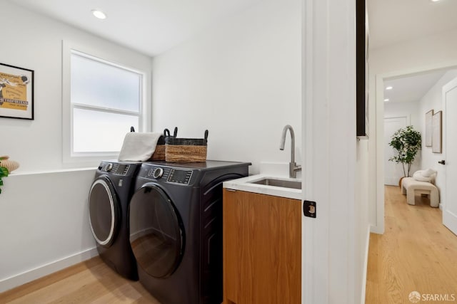 26 Southwood Dr, San Francisco, CA 94112 - laundry area featuring independent washer and dryer, light wood-type flooring, recessed lighting, and baseboards