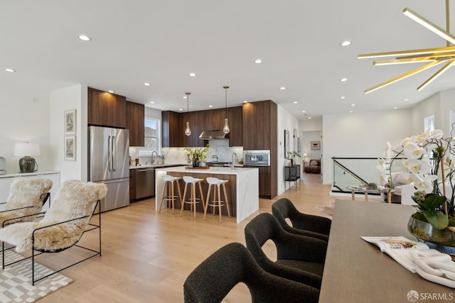 26 Southwood Dr, San Francisco, CA 94112 - living area featuring light wood-style floors and recessed lighting