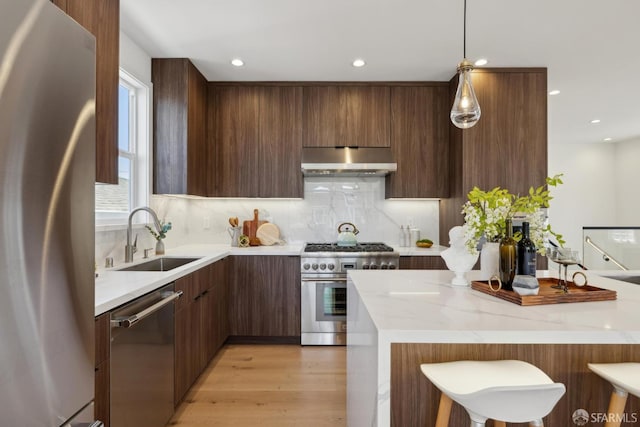 26 Southwood Dr, San Francisco, CA 94112 - kitchen featuring appliances with stainless steel finishes, extractor fan, a sink, modern cabinets, and recessed lighting