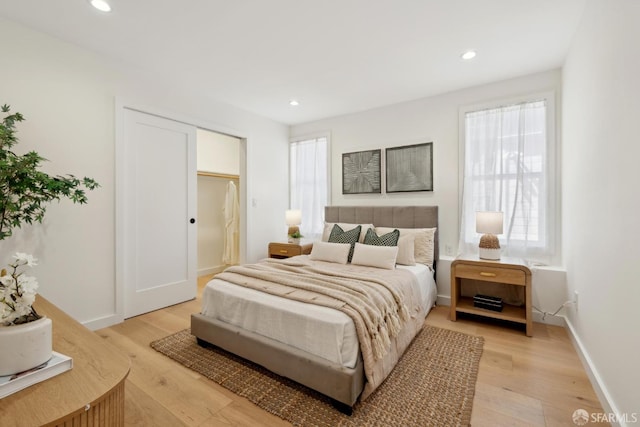 26 Southwood Dr, San Francisco, CA 94112 - bedroom featuring light wood-style floors, multiple windows, recessed lighting, and baseboards