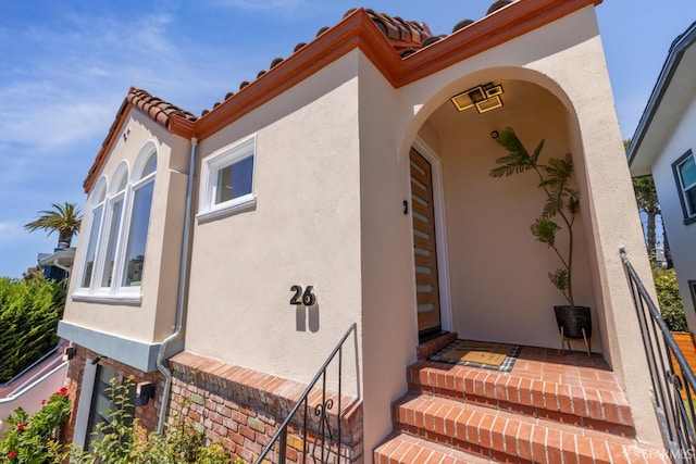 26 Southwood Dr, San Francisco, CA 94112 - entrance to property featuring stucco siding and a tile roof