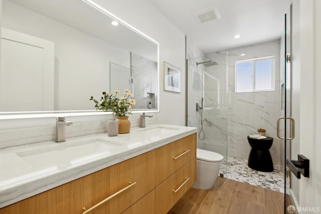 26 Southwood Dr, San Francisco, CA 94112 - full bathroom featuring toilet, a marble finish shower, double vanity, wood finished floors, and recessed lighting