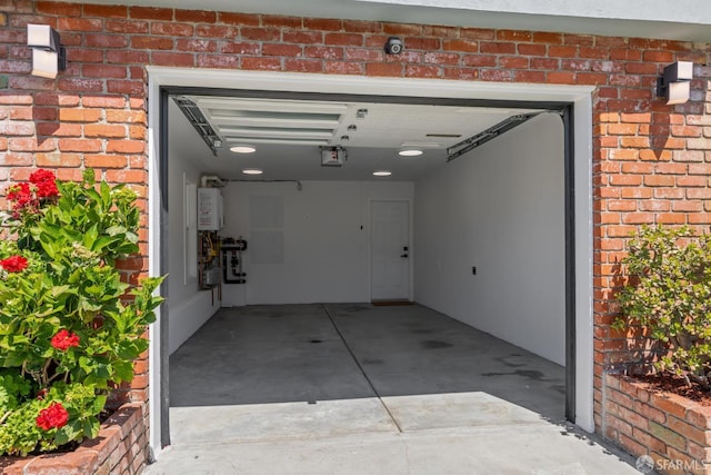 26 Southwood Dr, San Francisco, CA 94112 - garage with water heater and a garage door opener