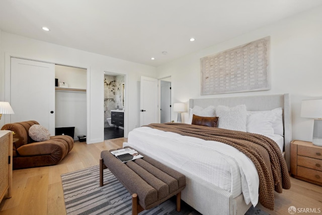 26 Southwood Dr, San Francisco, CA 94112 - bedroom featuring wood finished floors, recessed lighting, a closet, and connected bathroom