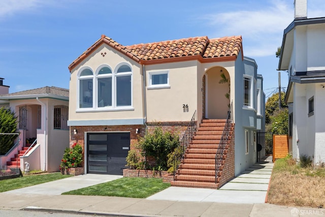 26 Southwood Dr, San Francisco, CA 94112 - mediterranean / spanish house featuring stairway, a tiled roof, stucco siding, and driveway