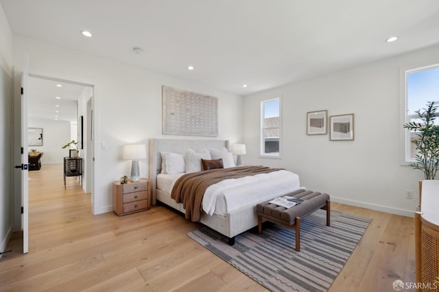 26 Southwood Dr, San Francisco, CA 94112 - bedroom featuring light wood-type flooring, multiple windows, recessed lighting, and baseboards