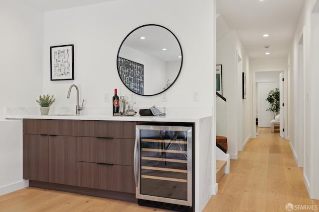 26 Southwood Dr, San Francisco, CA 94112 - indoor wet bar featuring beverage cooler, light wood finished floors, recessed lighting, baseboards, and stairs