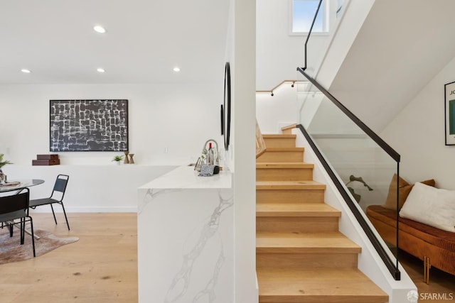 26 Southwood Dr, San Francisco, CA 94112 - staircase with wood finished floors and recessed lighting