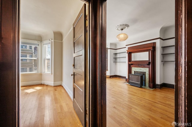 3340 24th St, San Francisco, CA 94110 - hall with light wood-style flooring and baseboards
