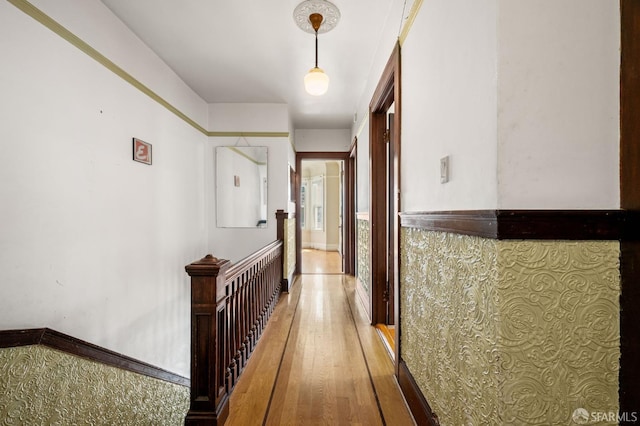 3340 24th St, San Francisco, CA 94110 - corridor with an upstairs landing and light wood-type flooring