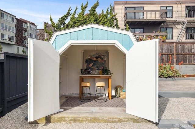 view of outdoor structure featuring an outdoor bar