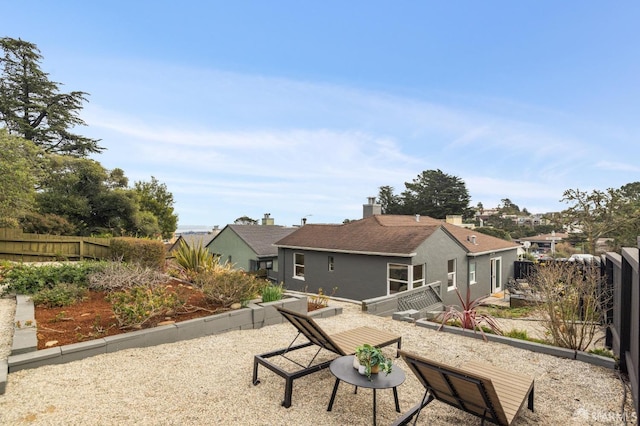 rear view of property with a patio