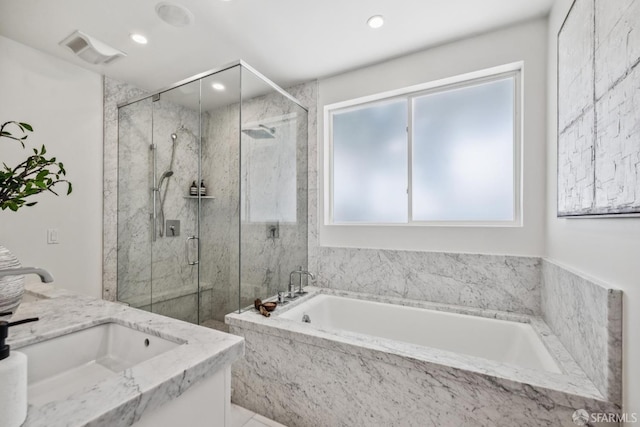 267 Bonview St, San Francisco, CA 94110 - full bath featuring a garden tub, a marble finish shower, vanity, and recessed lighting