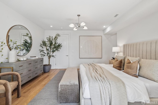267 Bonview St, San Francisco, CA 94110 - bedroom featuring a chandelier, light wood finished floors, and recessed lighting