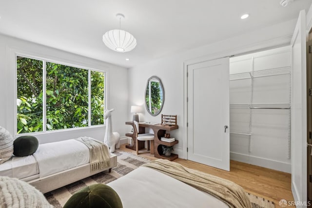 267 Bonview St, San Francisco, CA 94110 - bedroom with light wood-style flooring, a closet, and recessed lighting