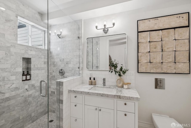 267 Bonview St, San Francisco, CA 94110 - bathroom featuring vanity, a shower stall, and decorative backsplash