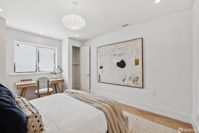 267 Bonview St, San Francisco, CA 94110 - bedroom with wood finished floors and recessed lighting