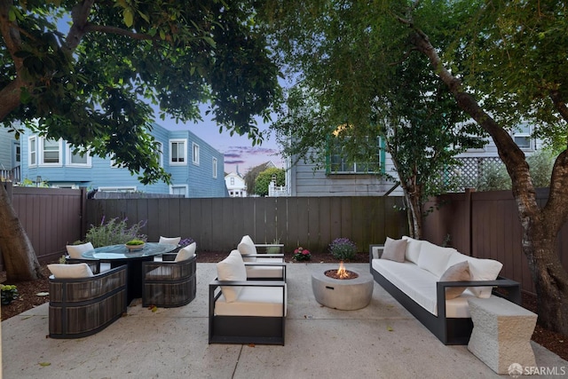 267 Bonview St, San Francisco, CA 94110 - fenced backyard featuring a patio area and an outdoor living space with a fire pit