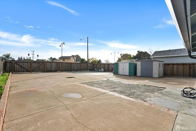 view of patio / terrace featuring a storage unit