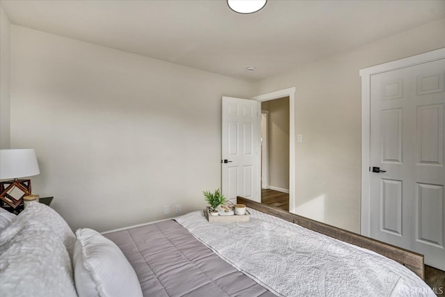 bedroom featuring wood-type flooring