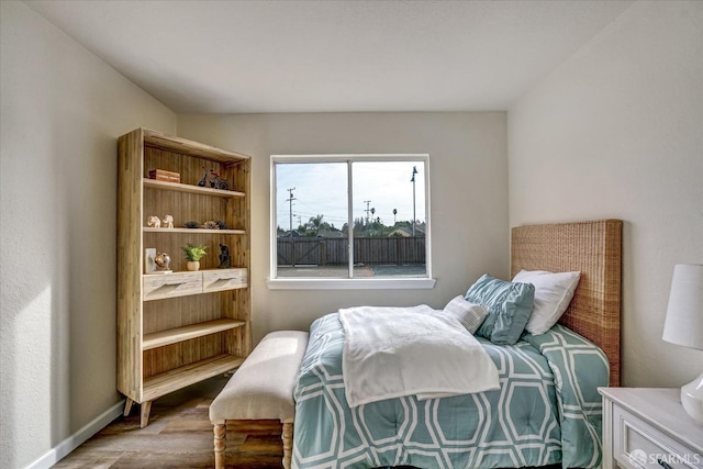 bedroom featuring wood-type flooring