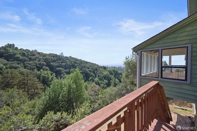 balcony with a forest view